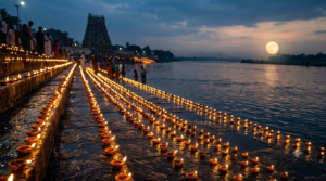 Karthika Pournami date and timings – oil lamps glowing on a river ghat at dusk