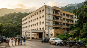 Nandakam rooms in Tirumala: TTD pilgrim guest house block with devotees at the entrance