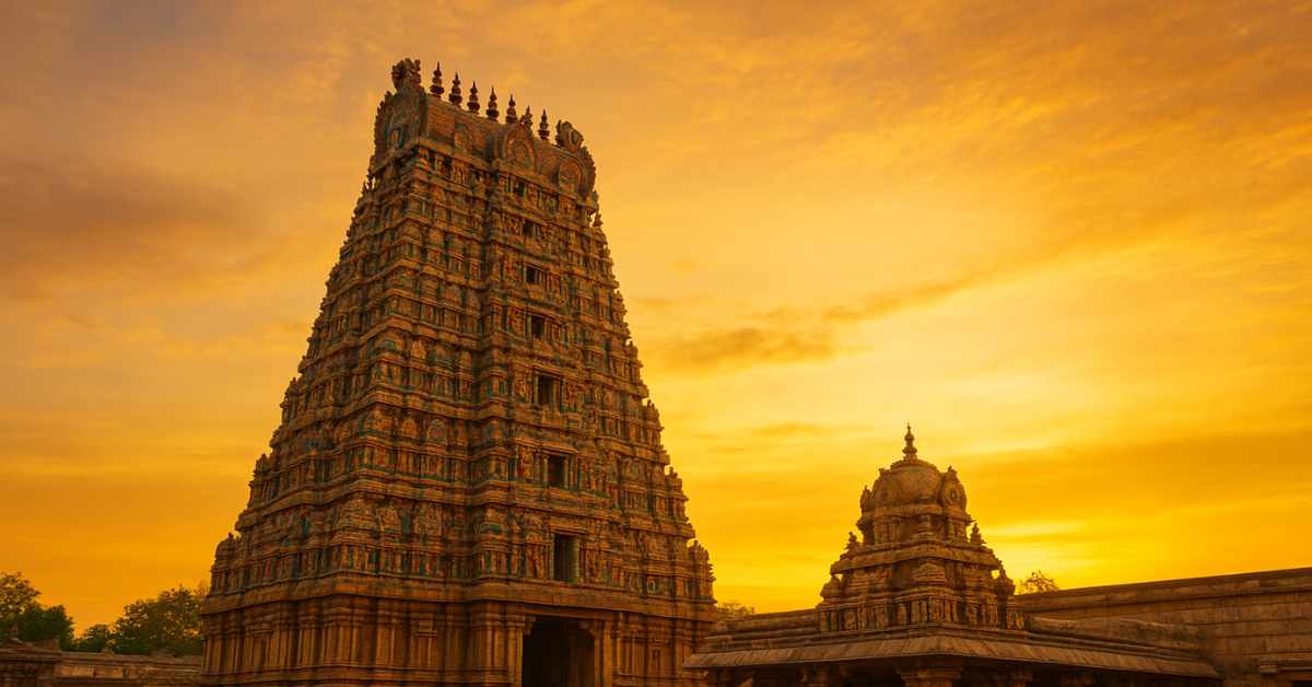 Andhra Pradesh temple pilgrimage – majestic gopuram and ancient temple at golden sunset